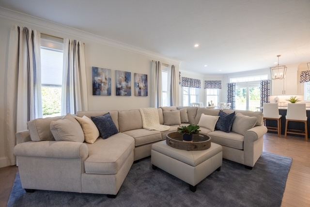 Family room of 37 Crestwood Circle, a 55+ luxury condominium with first-floor primary suite at Trailside Estates Rochester MA